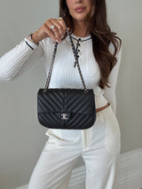 Chanel Seasonal Flap Bag In Black Chevron Caviar Leather With SHW
