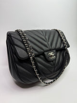 Chanel Seasonal Flap Bag In Black Chevron Caviar Leather With SHW